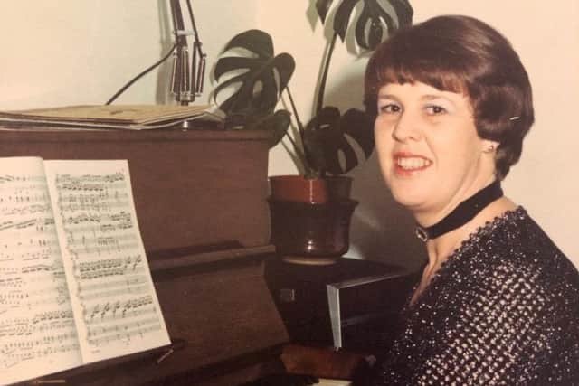 Gill at her piano during the '70s