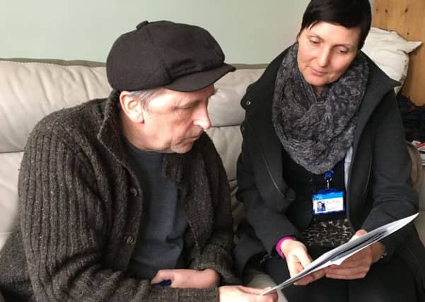 Crawford Medley with caseworker Kelly Murphy, who was assigned by the prevention assessment team