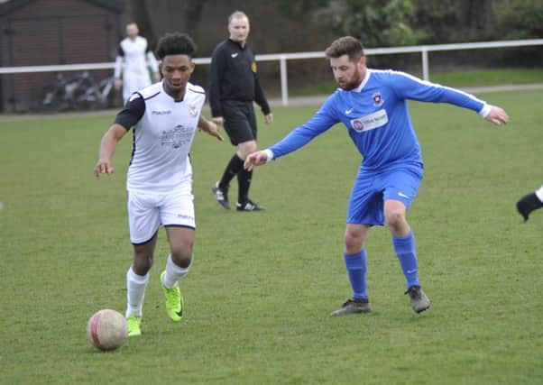 Joel Kalambayi on the ball during Bexhill United's 2-1 win at home to Oakwood on Saturday. Picture by Simon Newstead