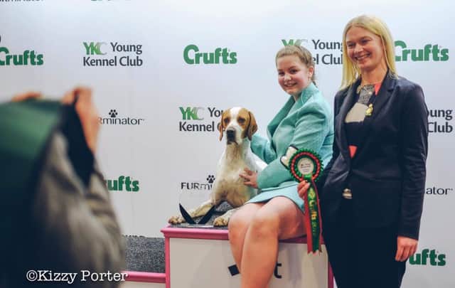 Lauren Goddard and dog Parker at Crufts. Picture by Kizzy Porter. SUS-190313-102057001