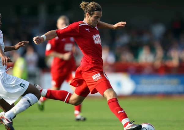 CRAWLEY, WEST SUSSEX - OCTOBER 01:  Sergio Torres of Crawley Town in action during the Npower League Two match between Crawley Town and Plymouth Argyle at the Broadfield stadium on October 1, 2011 in Crawley, West Sussex.  (Photo by Clive Rose/Getty Images) SUS-180123-000914002