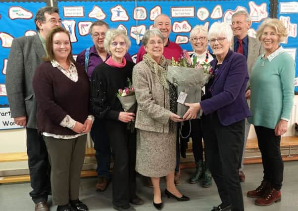 Val Court, centre, is retiring after 29 years service