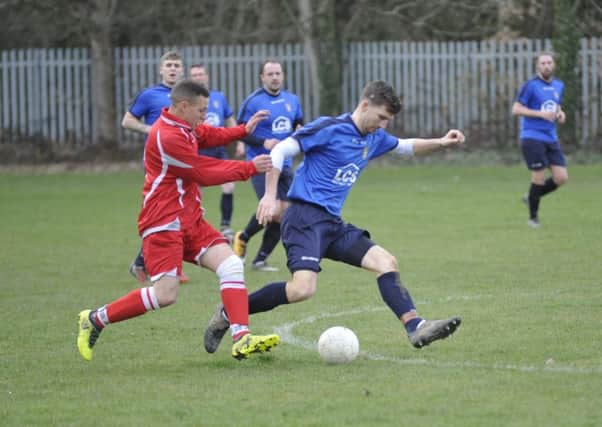 Action from the Robertsbridge Charity Junior Cup semi-final between Rock-a-Nore and Sedlescombe Rangers II. Pictures by Simon Newstead