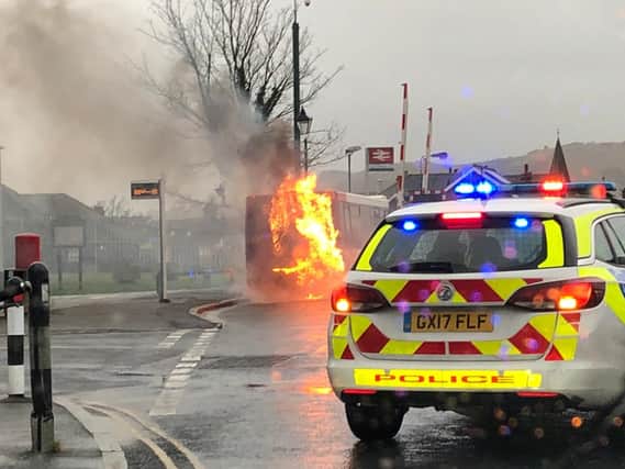 The ignited bus in Polegate High Street. Pic: Liam Tiffin