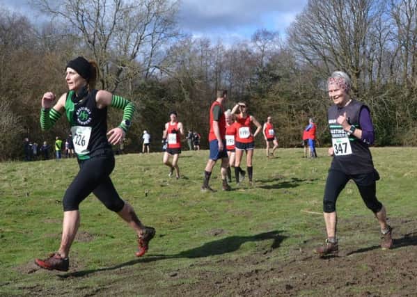 Shana Burchett (left) and Sarah Marzaioli tackle the final round of the East Sussex Sunday Cross-Country League event at Pett