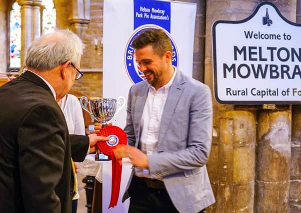 Phil Turner collects trophy for award-winning pie at British Pie Awards