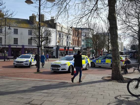 Police seen in Worthing town centre today (March 14)