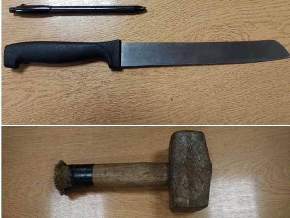 The knife and hammer seized by police. Picture via Sussex Police