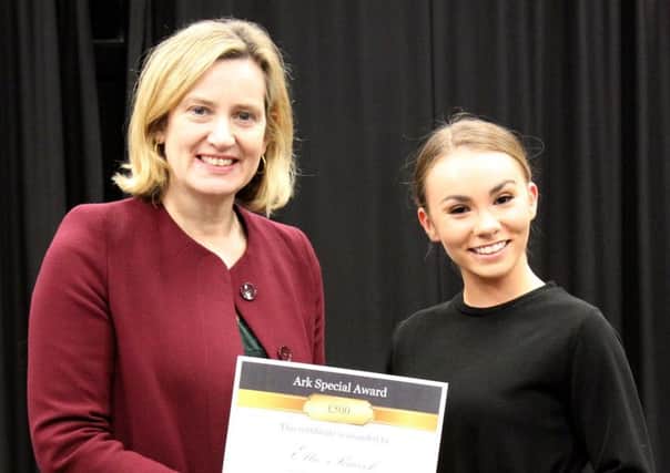 Ms Rudd with one of the students presented with a bursary SUS-190325-124209001