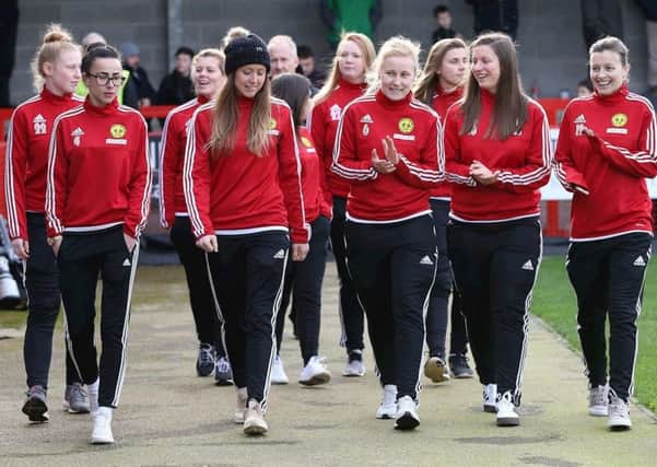 Crawley Wasps walking around the pitch while guests of Crawley Town 
PIC: Courtesy of James Boardman Telephoto Images SUS-191203-120634002
