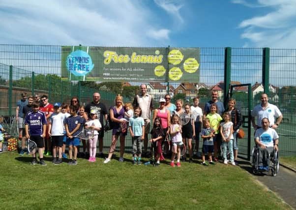 Some of the local residents who enjoyed the Tennis For Free event, 2018 SUS-190319-100433001