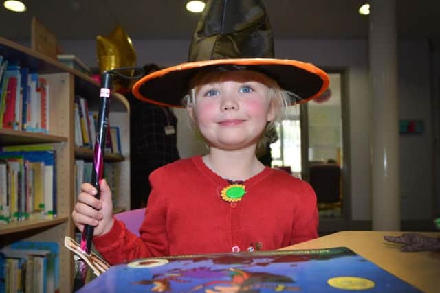 A White House Academy pupil in the refurbished library on World Book Day. Photograph: Justin Lycett/ hI06902 (2)