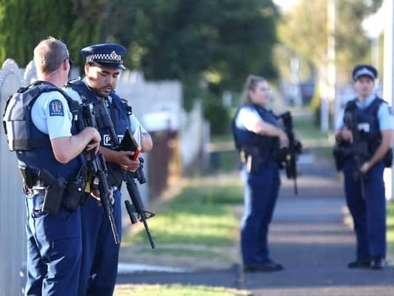 Armed police maintain a presence outside a mosque in Auckland, New Zealand. Picture: Getty Images/Phil Walter
