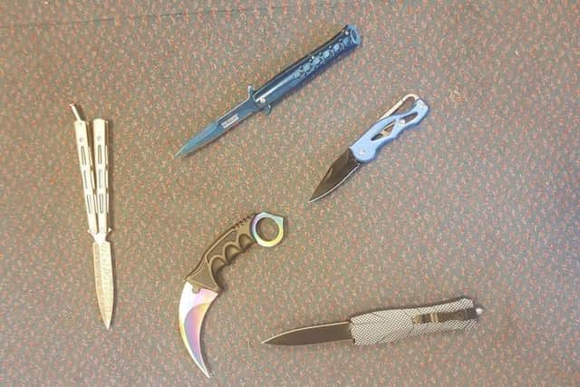 A quarter of the knives surrendered at the police station. Picture via Chichester Police