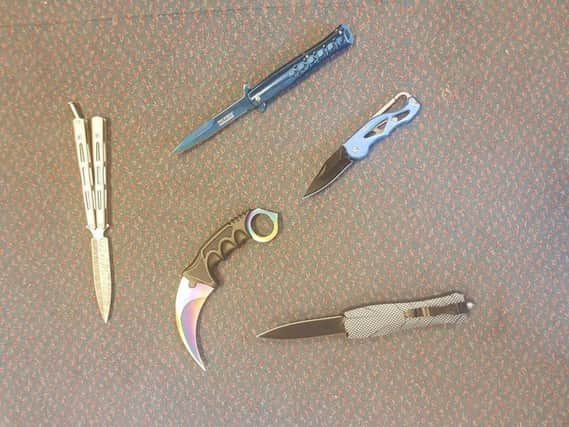 A quarter of the knives surrendered at the police station. Picture via Chichester Police
