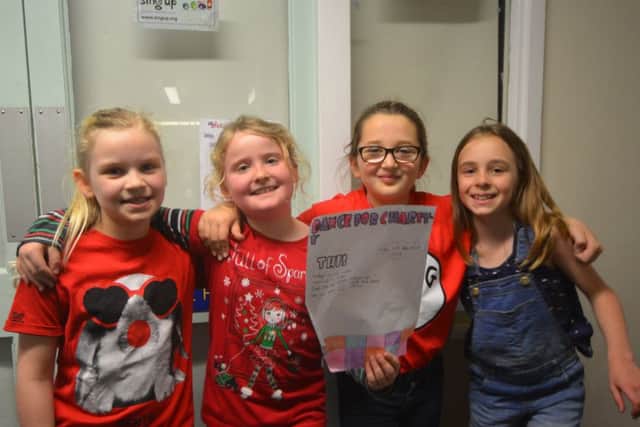 Four Upper Beeding Primary School pupils organised a Dance-A-Thon during their lunch hour on Red Nose Day