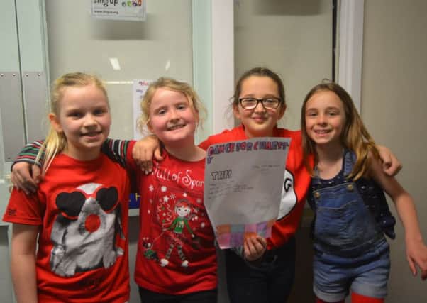 Four Upper Beeding Primary School pupils organised a Dance-A-Thon during their lunch hour on Red Nose Day