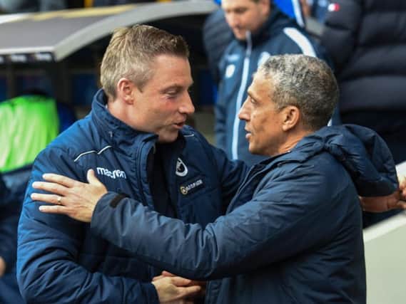 Millwall manager Neil Harris (left) and Brighton & Hove Albion boss Chris Hughton. Picture by PW Sporting Photography.