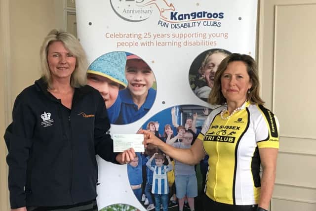 The cheque was presented by Angela Murray to Samantha Norwood