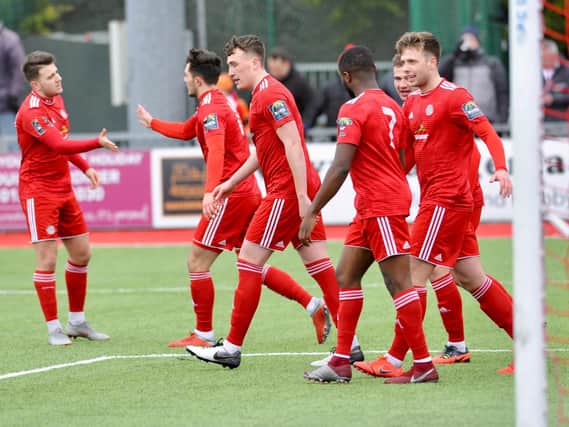 Worthing celebrate a goal in their 2-0 home win over Sussex rivals Whitehawk in the Bostik Premier on Saturday. All pictures by Stephen Goodger.