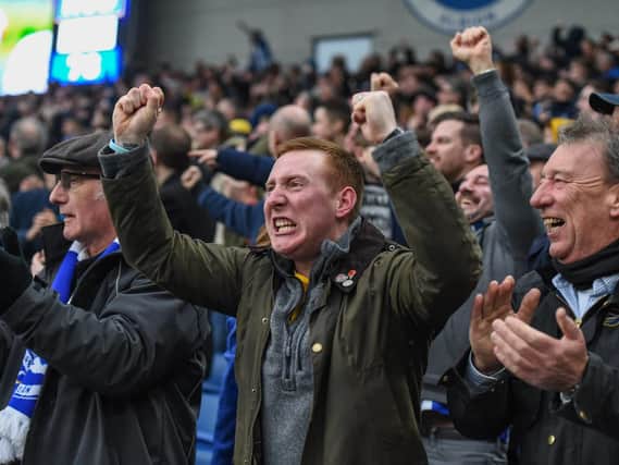 Brighton fans celebrate the win over Huddersfield this month. Picture by PW Sporting Photography