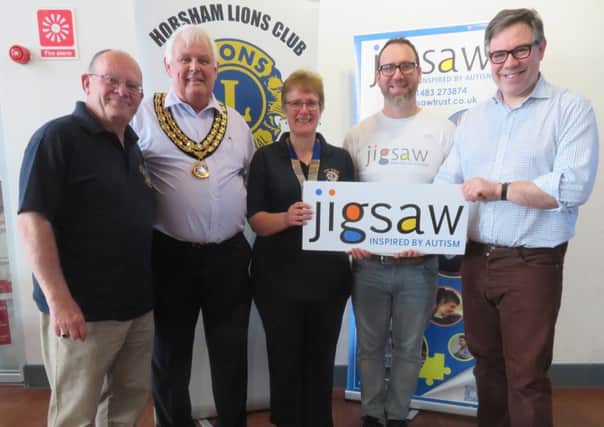 Horsham Lions and special guests from left to right: Immediate past president Lion David Trowbridge, Horsham District Council chair Peter Burgess, Lion president Clare Wilson and Horsham MP Jeremy Quin SUS-190320-112507001