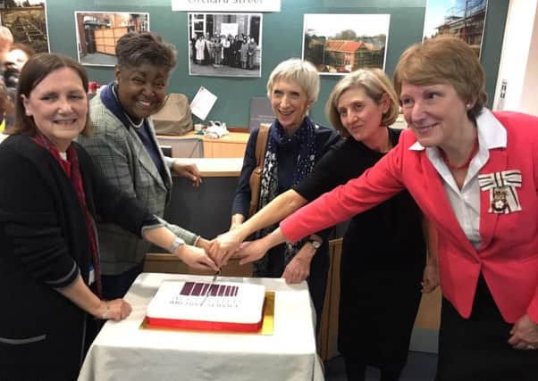 County Archivist Wendy Walker, Cabinet Member for Safer, Stronger Communities Debbie Kennard, West Sussex County Council Leader Louise Goldsmith, Director of Public Engagement at The National Archive Caroline Ottaway-Searle and Lord Lieutenant Mrs Susan Pyper cut the cake.