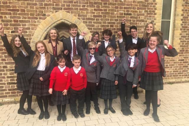 Chichester Free School children celebrate with interim principal, Jenny Clough (left) and newly appointed principal, Louise New, after the school retained its good Ofsted rating. Picture contributed