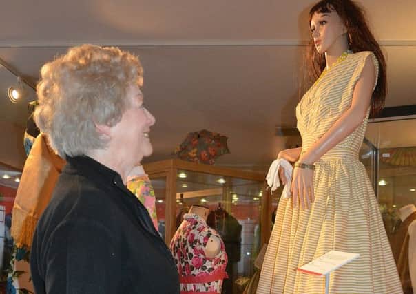 The 'Fabulous Fifties and Swinging Sixties' catwalk display at Bexhill Museum SUS-190320-153438001