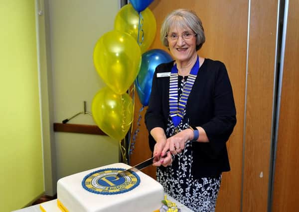 Littlehampton Probus Ladies Club president Jill Jacobs cuts the cake. Picture: Steve Robards SR1907817