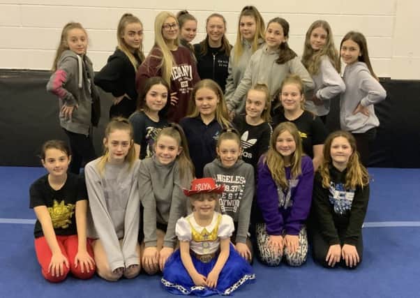 Outlaw Allstars Cheerleading Group is taking 21 young people to Disneyland Paris for an international competition