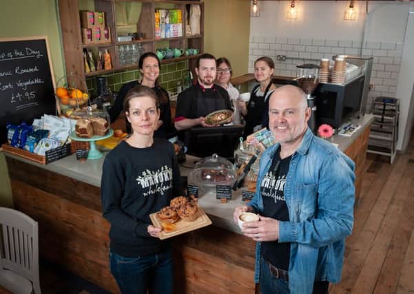Manuka Wholefoods shop in East Street, Chichester, West Sussex has just extended its offering by opening a Wholefoods Cafe within the store. In Pic: (Front) Trea and Grant Langford, owners of Manuka Wholefoods shop and cafe, and their staff in the new cafe. Photo by Scott Ramsey