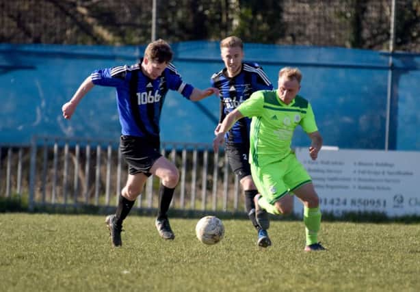 Action from Hollington United's recent home game against AFC Ringmer