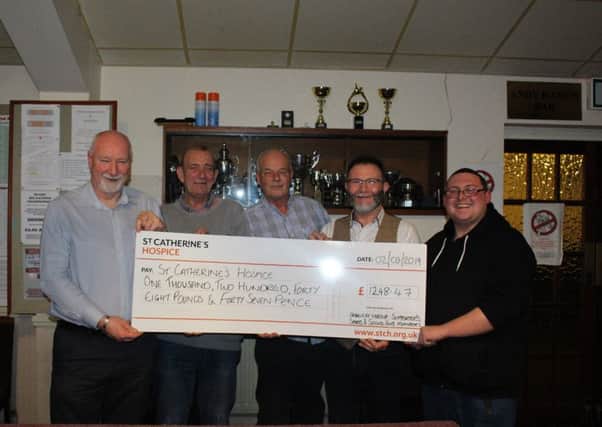 The Crawley Labour Supporters Sports & Social Club members did a chest wax, karaoke and raffle for St Catherine's Hospice, raising £1,248.47