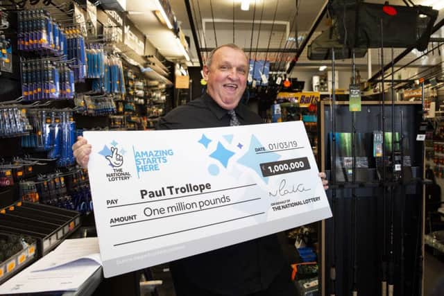 Paul Trollope from Horley celebrates his one million pound win