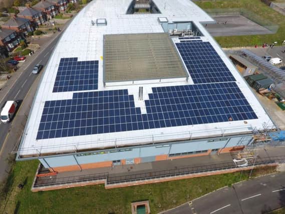 Solar panels on the roof of East Sussex College's Ore campus. SUS-190325-142422001