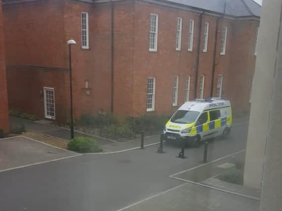 A police van parked on Longley Road.