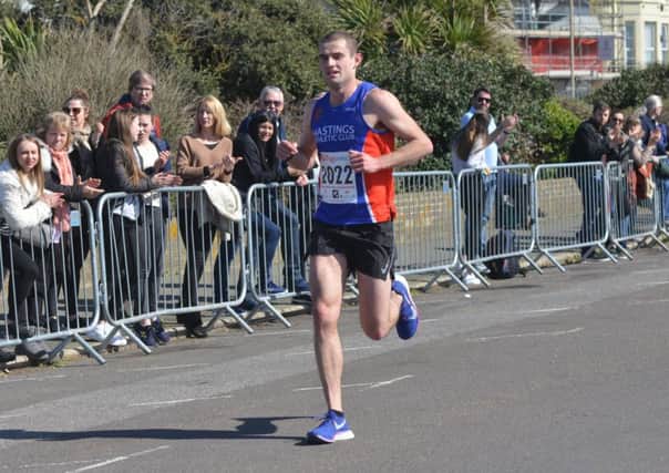 Rhys Boorman approaches the finish line in yesterday's Hastings Half Marathon. Picture by Justin Lycett