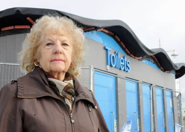 Cllr Jeanette Warr outside the closed toilets earlier this year. She said the promenade needed temporary toilets now