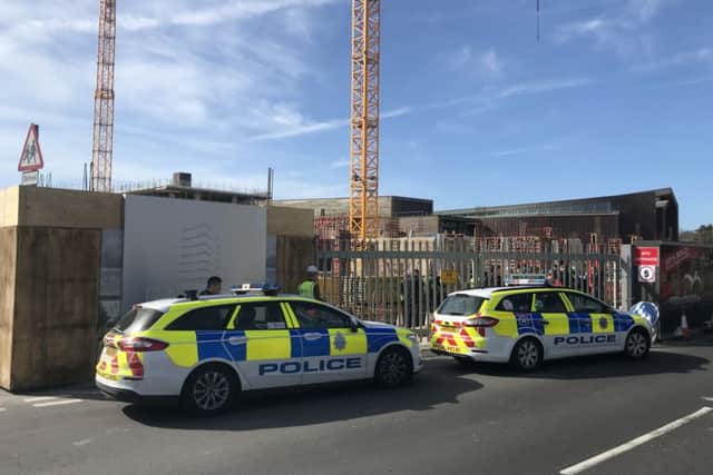 Police outside the Aquerena construction site in Worthing this morning (March 26)