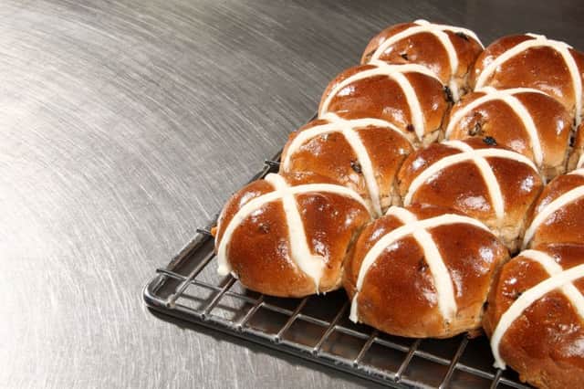 Closeup of Hot Cross Buns on a baking tray