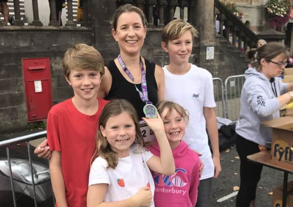 Emma Smith after the Winchester Half Marathon with her four children Oliver, Imogen, Sophia and Joseph