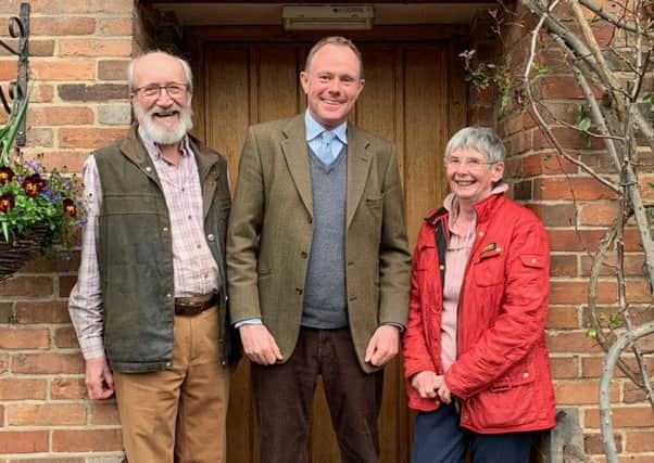 Joan and Bill Edwards, owners of The Five Bells Inn in West Chiltington, with Arundel and South Downs MP Nick Herbert SUS-190327-125545001