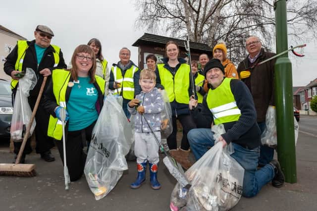 Wick, Littlehampton, West Sussex, UK. 22nd March 2019. The Wick Village Traders Association organise a spring clean event of Wick Village in Littlehampton to support The Great British Spring Clean national campaign. In Pic: Volunteers collect rubbish in Wick.
