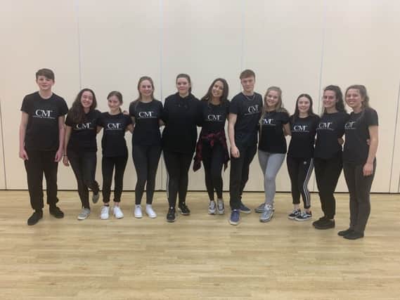 Charlotte Tyler with members of her CMT Performing Arts Academy SUS-190204-144315001
