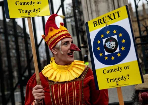 Brexit protesters demonstrate outside the Houses of Parliament (Photo by Jack Taylor/Getty Images) SUS-190328-124559001