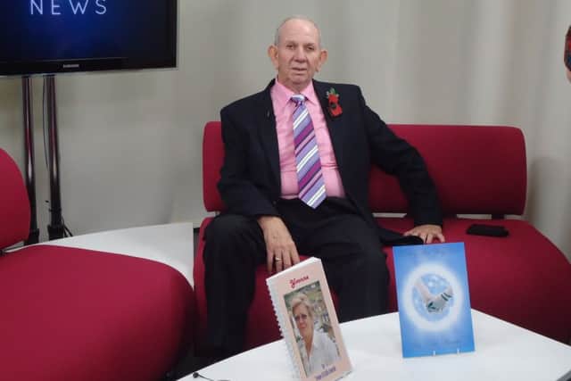 Keith aged 70 in a TV studio promoting a book he wrote for charity SUS-190328-130343001