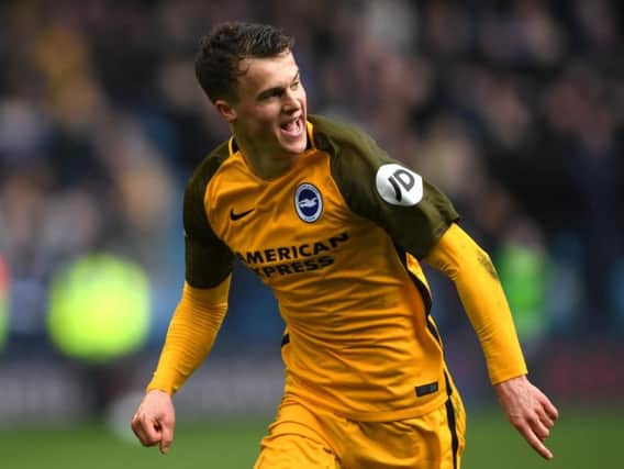 Solly March celebrates his late equaliser at Millwall. Picture by Getty Images