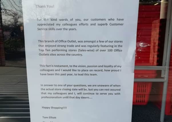 The message in the window of the Horsham town centre branch of Office Outlet