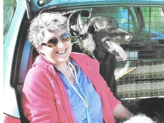 Susan Carr enjoyed going on beach walks with her husband and their dogs
